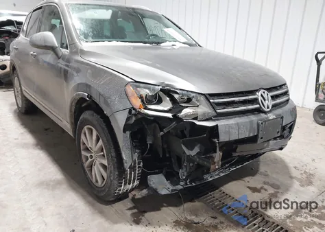 2014 Volkswagen Touareg 3.6L Sport z USA, uszkodzony, nr VIN WVGEF9BP5ED012353